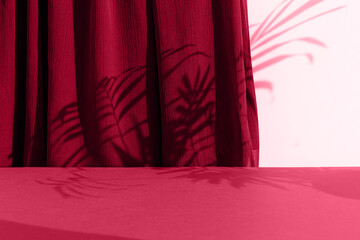 A scene with a magenta curtain and the shadow of palm leaves. Premium podium for the presentation...