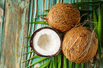 Obraz na płótnie Canvas fresh natural coconut on rustik wooden background