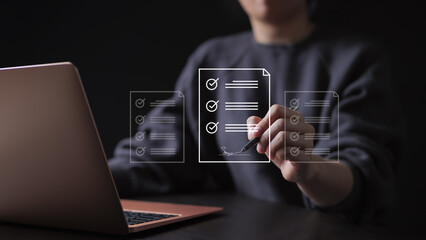 E-document management Paperless workplace. Online business contract Electronic signature concept. e-signing, businesswoman signs an electronic document on virtual screen using a pen.