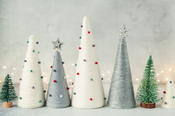 Handmade Christmas trees. Yarn wrapped cone trees. XMAS gifts. DIY concept
