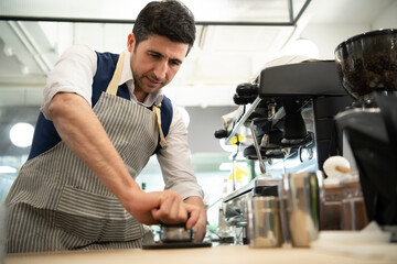 Coffee expert barista Making hot Americano for customers