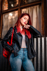 Obraz premium Young beautiful red hair woman wearing casual clothing on the street. Female fashion model red hair.