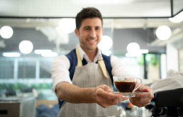 Coffee expert barista Making hot Americano for customers