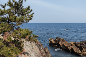 A shot of the ocean and rocks in Pohang, South Korea