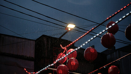 Street lighting was showered with rain with Chinese New Year lanterns