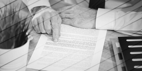 Hands of man checking document, geometric pattern
