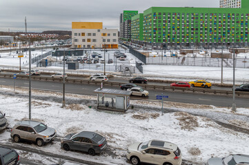 Obraz premium View from the fourth floor to the road and the bus stop