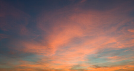 Naklejka na ściany i meble Panorama background of cloudy blue and orange sky, Sky texture
