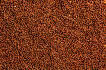 Buckwheat groats texture background. Organic raw dry Buckwheat grains background.