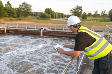 Environmental engineers work at wastewater treatment plants,Water supply engineering working at...