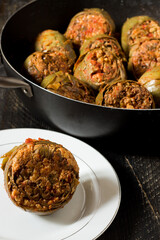 Artichokes stuffed with breadcrumbs and egg, with herbs and spices. Poor recipe of peasant cuisine