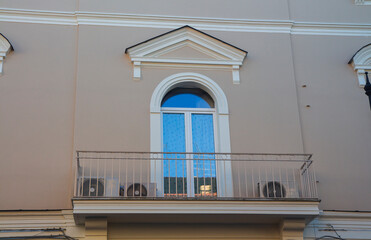 characteristic and ancient facade of a building in Aversa