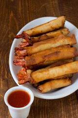 The shrimp roll and the sweet and sour sauce. Homemade Chinese recipe.