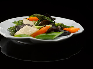 Sauteed Asparagus with Chinese Yam and Black Fungus served dish isolated on background top view food