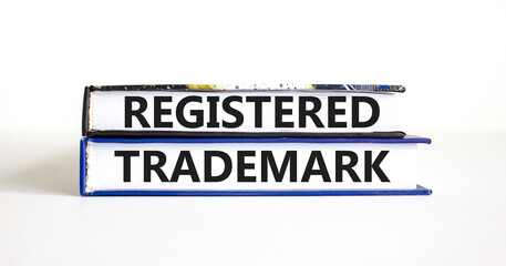 Registered trademark symbol. Concept word Registered trademark on books. Beautiful white table white background. Business and registered trademark concept. Copy space.