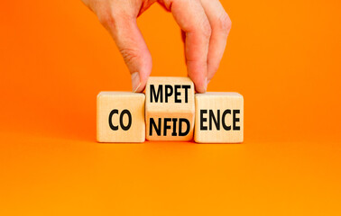 Competence and confidence symbol. Concept word Competence Confidence on wooden cubes. Businessman...