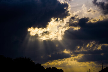 sun peeking through the clouds