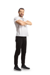 Full length portrait of a sports coach posing and smiling