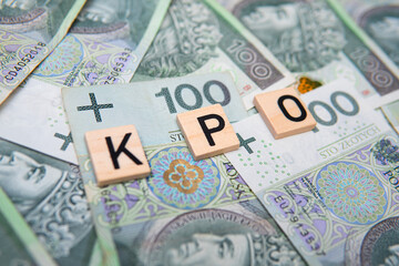Inscription KPO which is Krajowy Plan Odbudowy next to Polish Money. Concept showing Next...