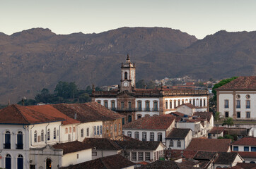 Fototapeta na wymiar Panoramic view of the Tiradentes square, focusing the Museu of the Inconfidents, baroque colonial styled architecture in the historical city of Ouro Preto,Minas Gerais. On a bright sunny day afernoon