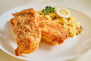 Fried carp with potato salad