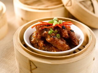 Steamed Chicken Feet with Black Bean Sauce served in dish isolated on table top view of food
