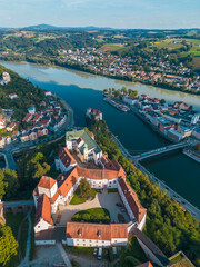 Aerial view of Fortress Veste Oberhaus and Veste Unterhaus with the old town of Passau in the background, Passau Germany
