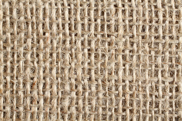 Background - rough sackcloth cloth. Closeup. Macro