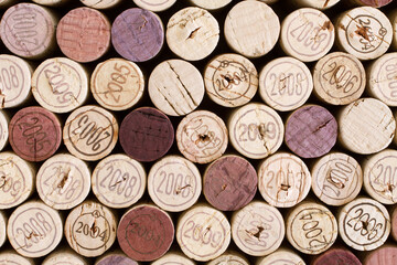 Cork wine bottle tops with numbers of years located tightly to each other