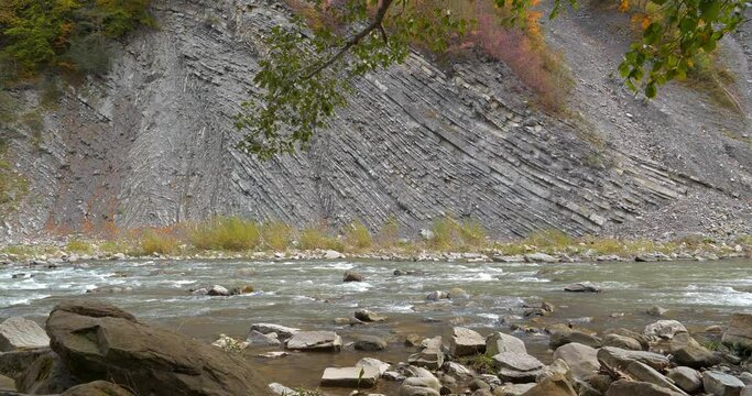 Prut river and mountain folds in Yaremche, Ukraine, known as Yaremche folds - biggest outcrop of Stryi formation in Europe. Here rocks of this formation are folded and faulted, gothic or chevron types
