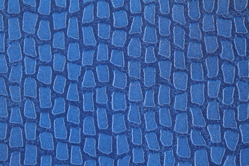 Navy blue with light blue incertions artificial leather texture. Macro