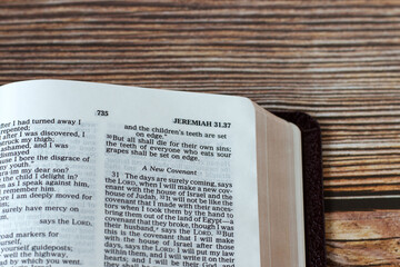 New covenant prophecy verses in open holy bible book. A closeup. Studying Jeremiah prophet old...