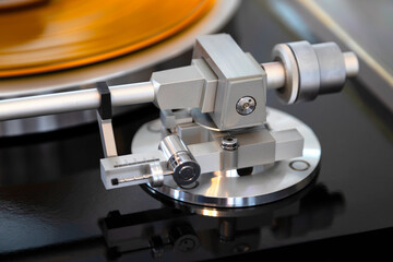 Vintage Stereo Turntable Vinyl Record Tonearm Mechanism Closeup. - 556529621