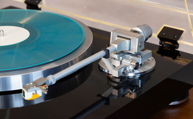 Vintage Stereo Turntable Vinyl Record Tonearm Mechanism Closeup. - 556529653