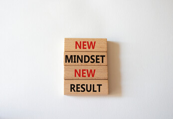 Mindset symbol. Wooden blocks with words New Mindset new Result. Beautiful white background. Business and New Mindset new Result concept. Copy space.