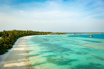 Aerial photography of a tropical island in the Maldives. Shot from a drone