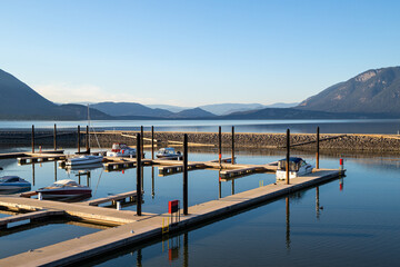 Shuswap Lake, Salmon Arm Wharf, Canada at sunset with boats