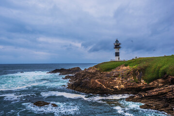 Fototapeta na wymiar Lighthouse on the coast, Ribadeo, Spain