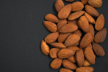 almond kernels on a dark background