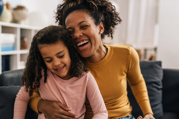 Fototapeta premium Mother and daughter smile together