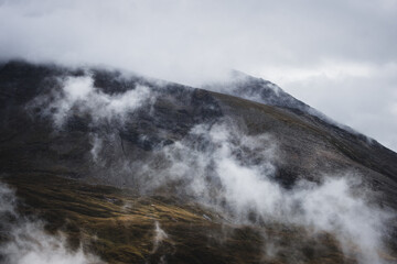 A view of the Austrian Alps on the Grossglockner. Foggy day in the mountains. Shot of beautiful steep rocks.