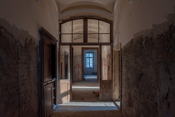 Fototapeta na wymiar Interior of an abandoned old historic palace mansion in Poland in Central Europe