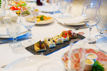 snacks and empty wine glasses on the table. catering 