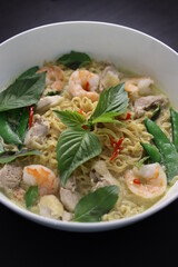 Thai Green Curry Instant Noodles with Thai Basil, Shrimp, Chicken, Thai Chilis, Snap Peas - Closeup