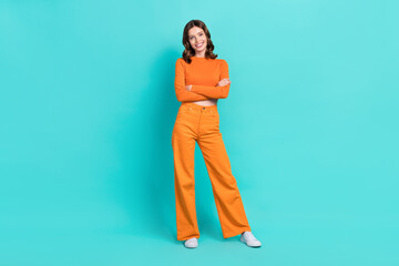 Fototapeta na wymiar Full length photo of adorable lovely lady dressed bright nice outfit arm folded isolated on cyan color background