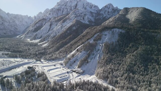 Ski Jump in Planica near Kranjska Gora Slovenia covered in snow at winter time, aerial view.