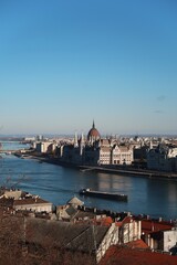 Fototapeta na wymiar View of the Danube, the Hungarian Parliament Building in Budapest, vertical photo