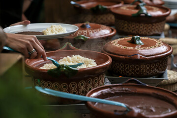 typical clay pot for buffet of traditional mexican food in Mexico