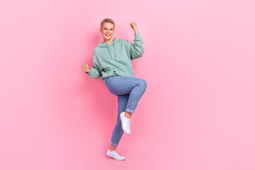 Fototapeta na wymiar Full length photo of overjoyed lady wear trendy clothes rejoice win competition award prize empty space isolated on pink color background