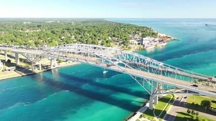 Aerial zoom to the Blue Water Bridge bordering Sarnia and Port Huron 4K